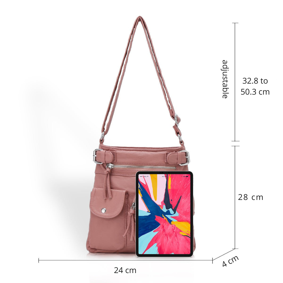 Women's anti-theft bag worn cross-body, showcasing its slim profile & comfortable fit.