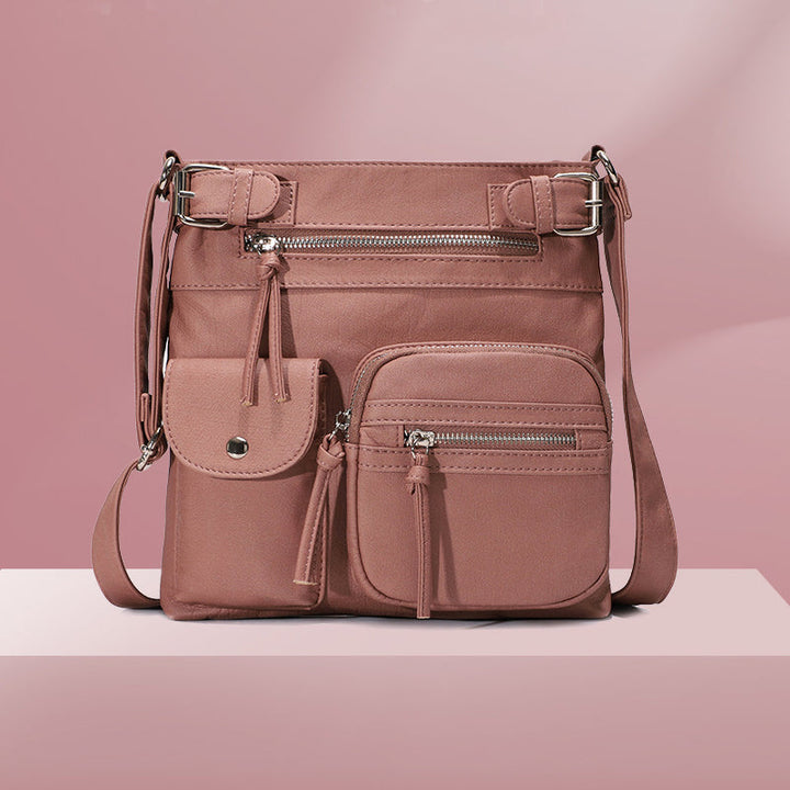 Stylish women's secure crossbody bag with multiple compartments for organized essentials.