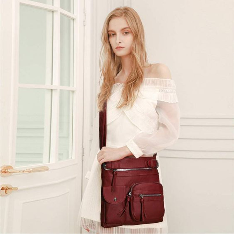 Versatile women's crossbody travel bag, featuring cut-resistant straps & RFID protection.