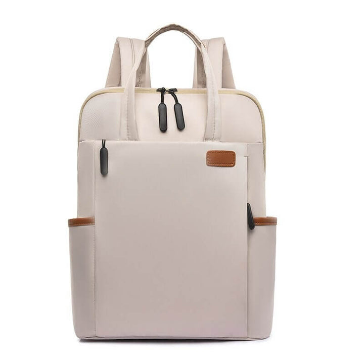 Women's anti-theft travel backpack, water resistant. Lightweight oxford fabric for secure journeys.