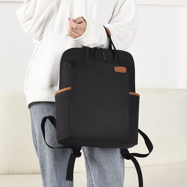 Women's anti-theft water resistant backpack. Lightweight, durable oxford fabric travel & everyday security bag.