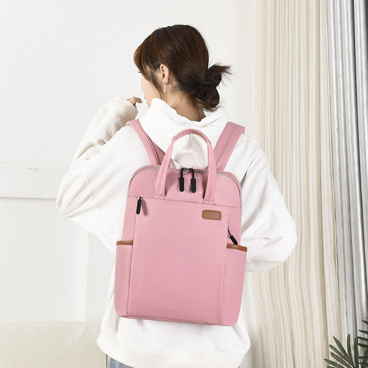 Everyday women's anti-theft backpack, water resistant. Perfect for commute & daily essentials. Oxford fabric.