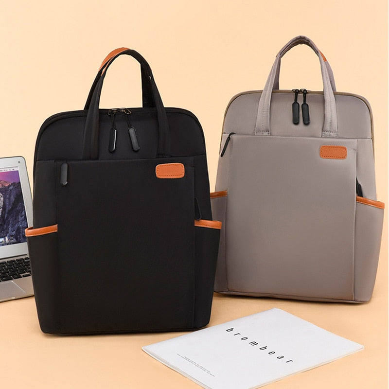 Women's anti-theft, water resistant travel backpack. Lightweight, secure oxford fabric for daily use.