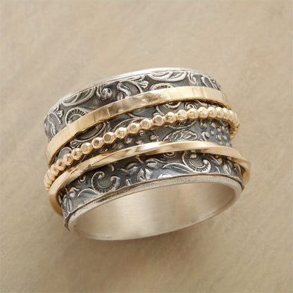 Women's Antiquity Gilded Flora Ring with intricate floral design, vintage style artisan metal, unique statement.