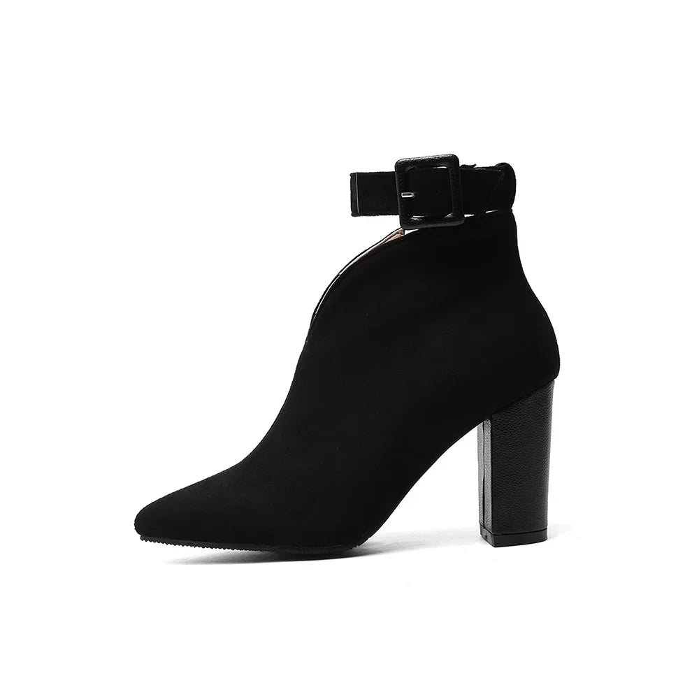 Stylish Ardena women's ankle boots, featuring a prominent buckle, pointed toe, and elegant block heel.