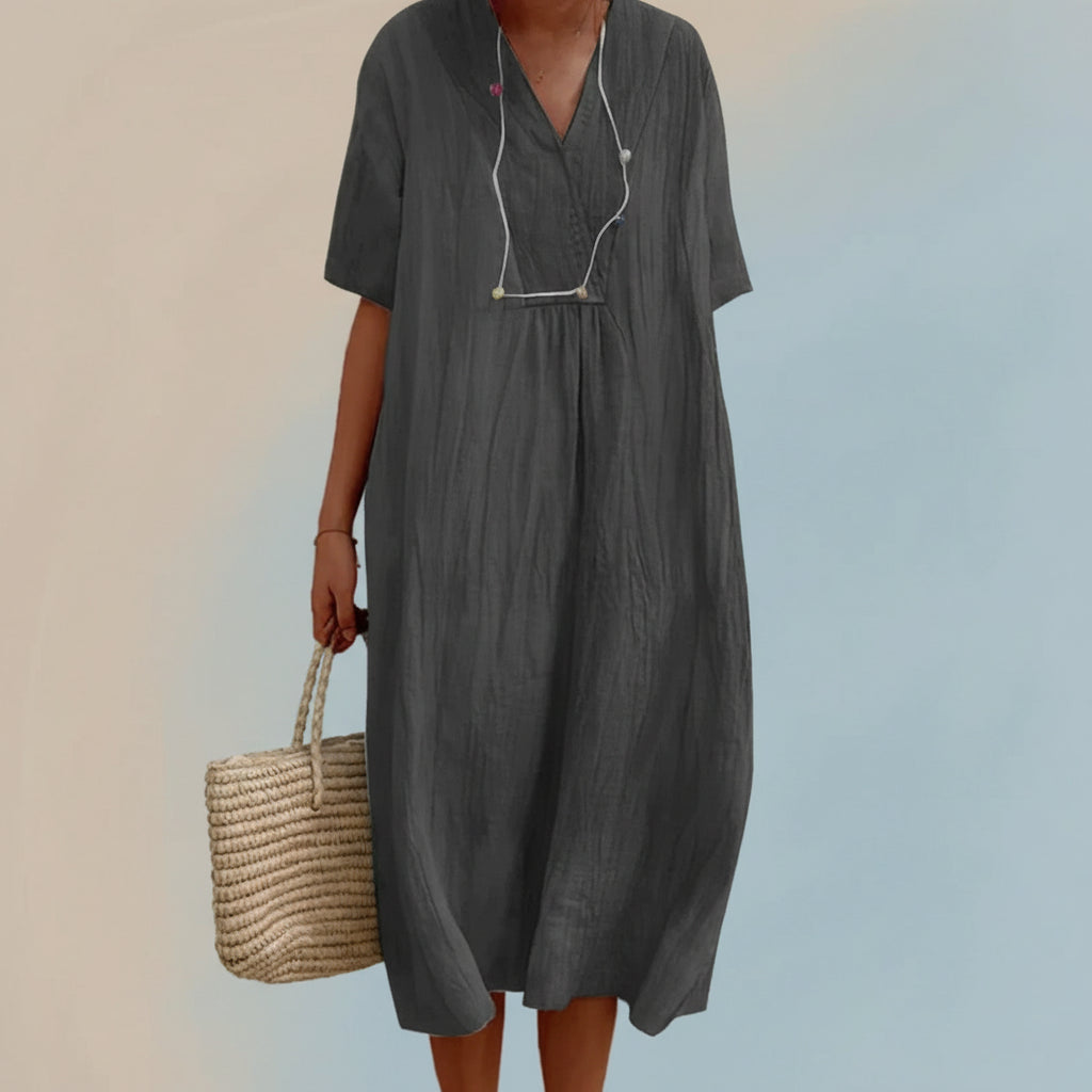 Stylish women's Aria summer dress. A comfortable V-neck midi dress, ideal for warm weather and beach days.