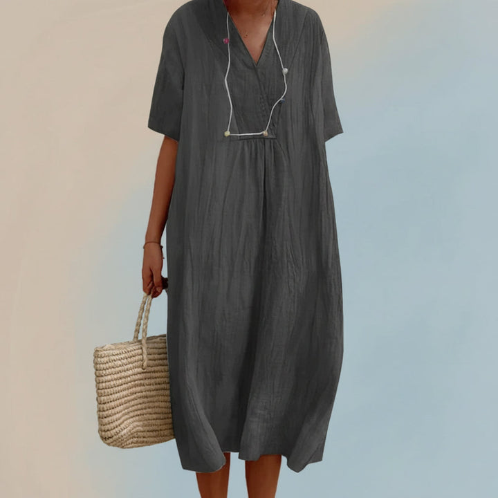 Stylish women's Aria summer dress. A comfortable V-neck midi dress, ideal for warm weather and beach days.