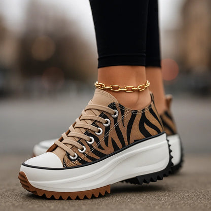 Women's Arlina Rise platform sneakers for elevated comfort, featuring orthopedic & shock-absorbing design.