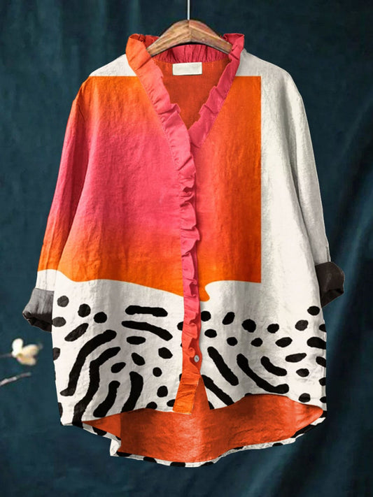 Women's artistic asymmetric ruffle blouse in a flowing, elegant style for summer & spring fashion.