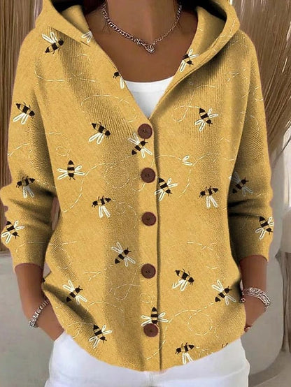 Artistic long cardigan for women. Cozy knit, warm layering piece, ideal for fall and winter fashion.