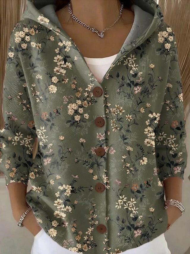 Cozy women's long artistic cardigan, showing unique pattern. An effortless layering piece for fall fashion.