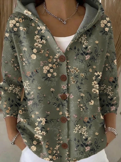 Cozy women's long artistic cardigan, showing unique pattern. An effortless layering piece for fall fashion.
