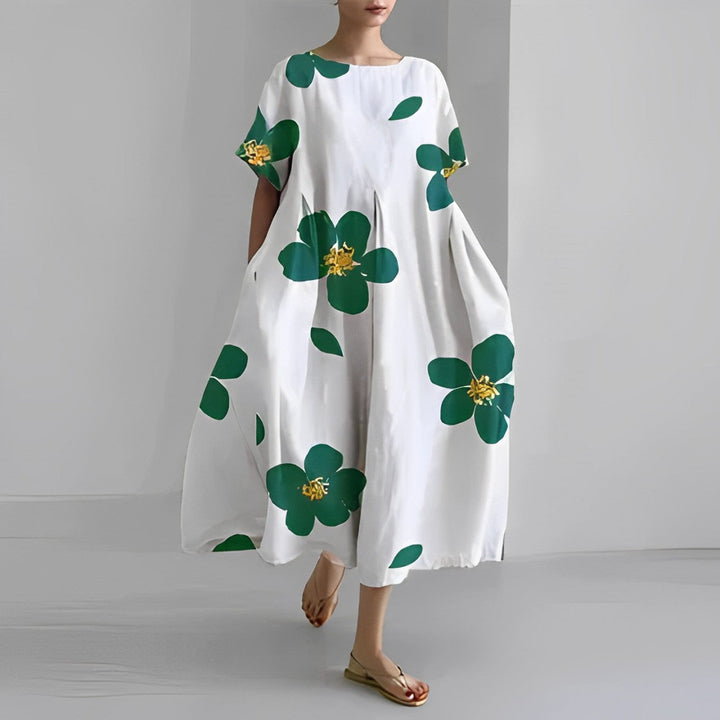 Relaxed fit artistic print midi dress for women with pockets. Ideal casual wear for summer & vacation.