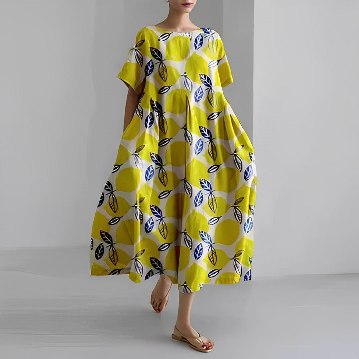 Artistic print women's midi dress. Round neck, short sleeve, flowy, and breathable, ideal for casual wear.
