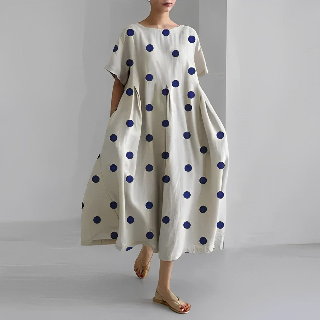 Versatile women's artistic print midi dress. Relaxed fit for casual, summer, or vacation outfits.
