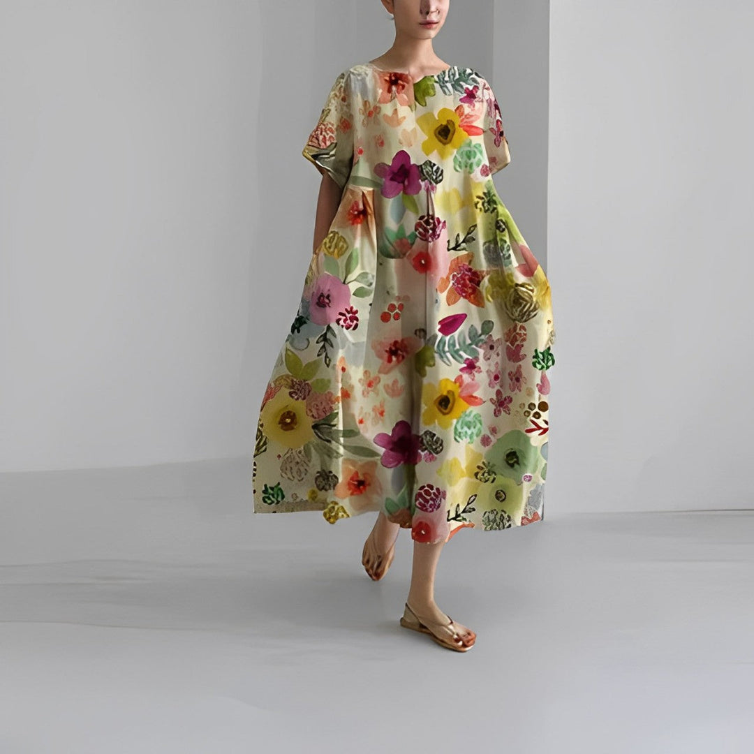 Women's casual artistic print midi dress with pockets. Relaxed flowy fit for comfortable everyday wear.