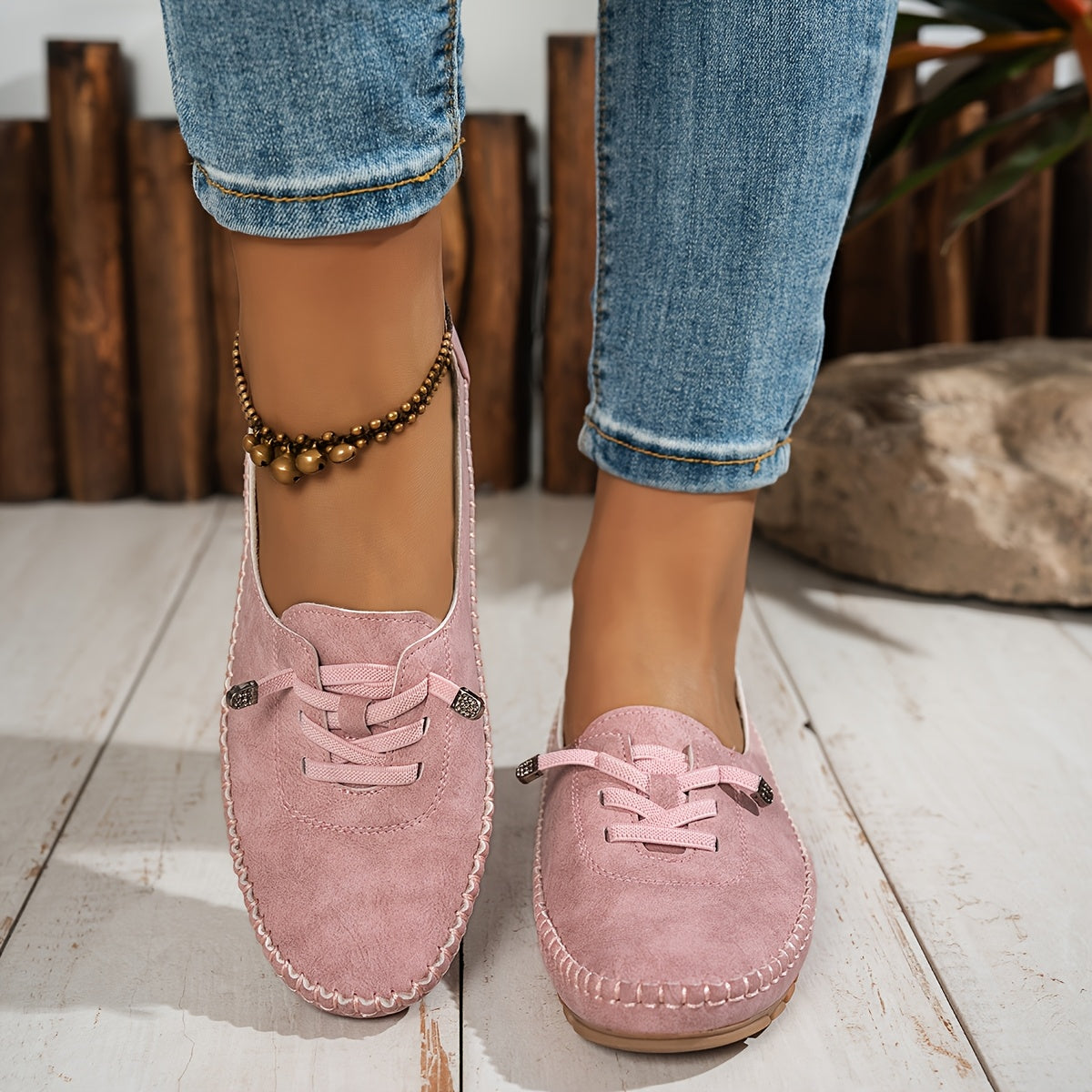 Woman wearing Ashley casual slip-on loafers, providing arch support & comfort for sensitive feet.