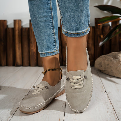 Top view of Ashley women's slip-on shoes, showcasing tassel detail, arch support, and comfortable design.