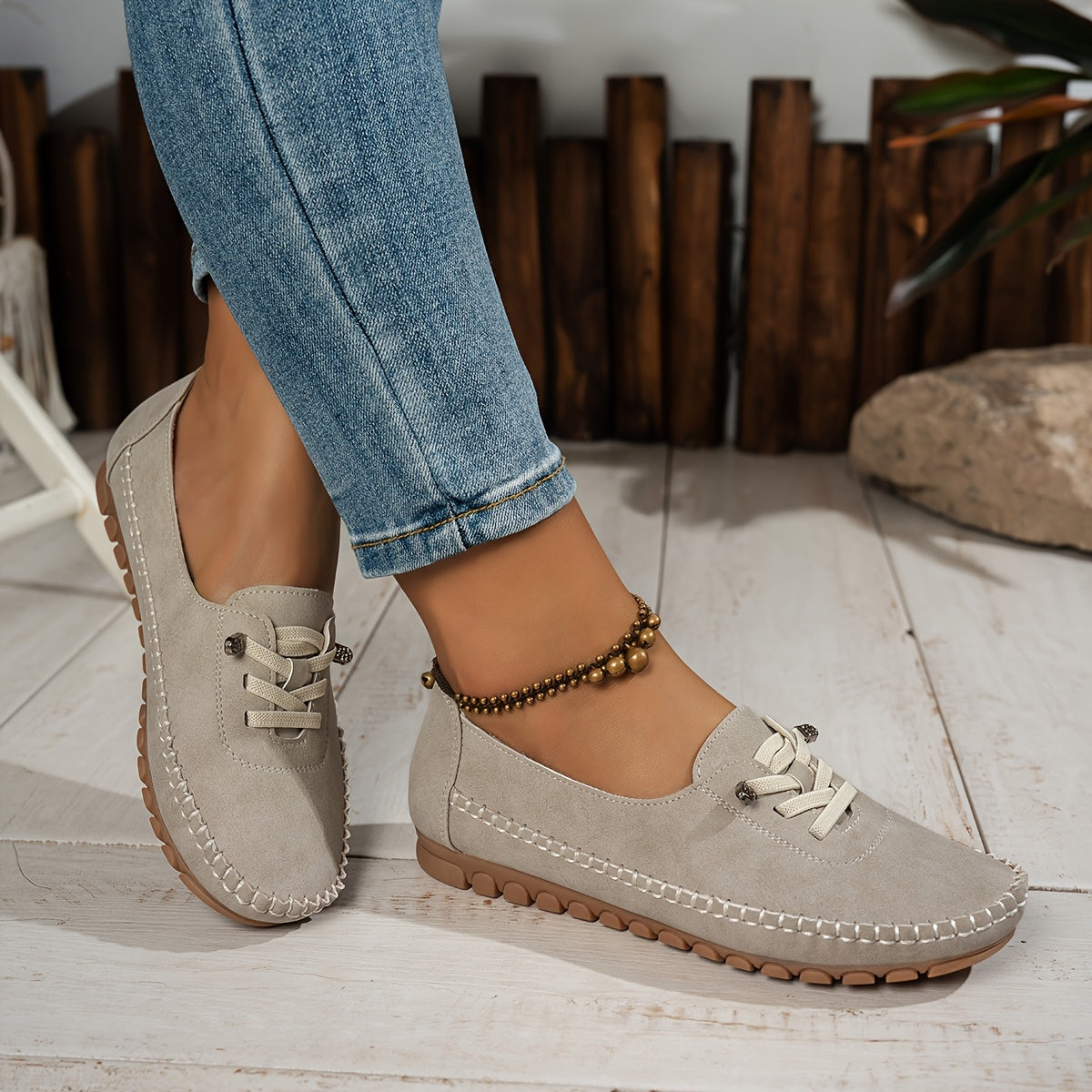 Side view of Ashley women's arch support slip-ons, elegant design with flexible sole for sensitive feet.