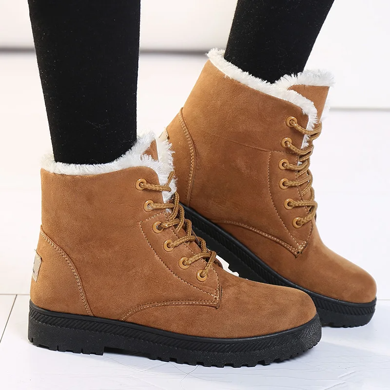 Stylish women's Aspen plush winter boots. Warm, cozy, and waterproof footwear with secure grip for cold weather.