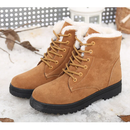 Lace-up women's snow boots. Aspen plush winter boots provide cozy warmth and secure traction for snowy adventures.