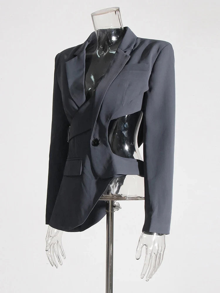 Unique women's blazer featuring an asymmetric cutout and chic bell sleeves. Modern, sophisticated outerwear.