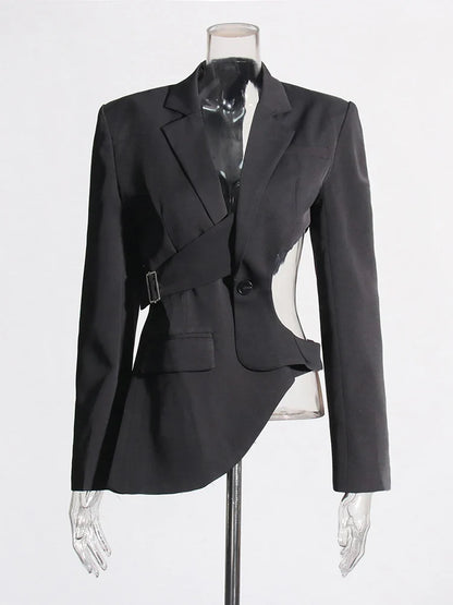 Contemporary women's blazer featuring an asymmetric hem, cutout detail, and trendy bell sleeves.