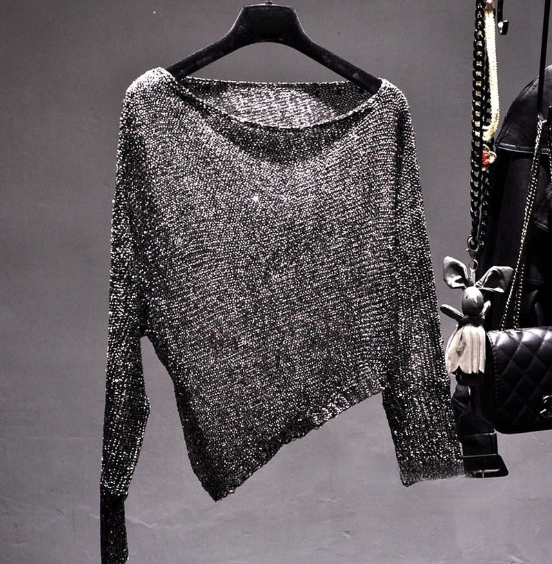 Glamorous asymmetric sequin party top for women. Sparkle & chic style for evening wear apparel.