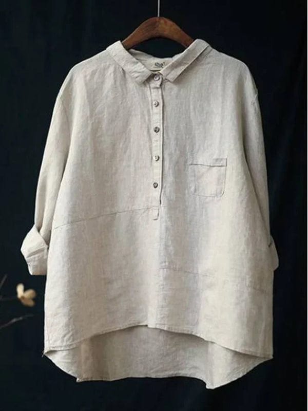 Comfortable women's relaxed fit button-up blouse with asymmetrical hem, perfect for casual summer days.