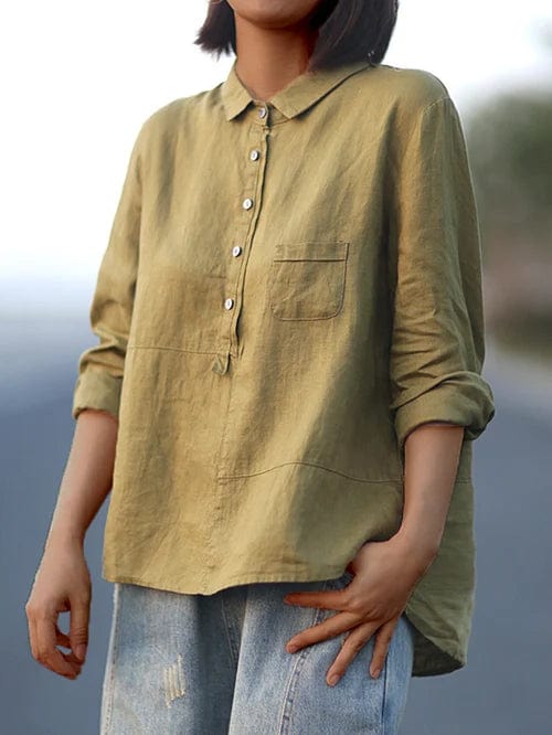 Women's comfortable asymmetrical hem blouse. This stylish long sleeve button-up is perfect for casual wear.