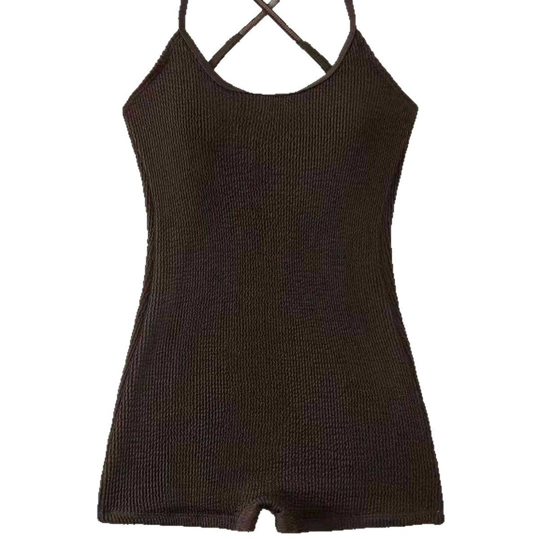 Chic women's athletic ribbed one-piece swimsuit, great for beach sports, performance, & active summer swimwear.
