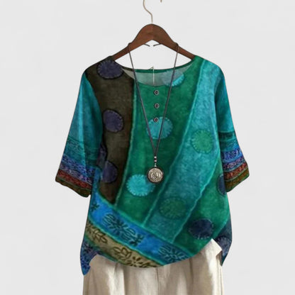 Elegant women's bohemian patchwork long sleeve top, a versatile and comfortable blouse for casual or travel wear.