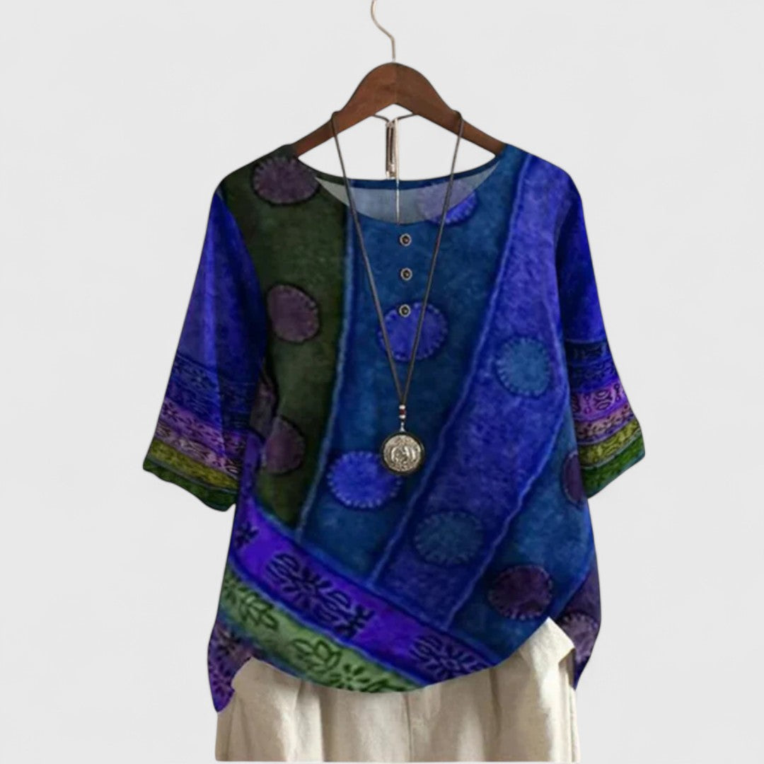 Vibrant women's Auralie patchwork long sleeve top, an elegant bohemian blouse with unique prints for fall & spring fashion.
