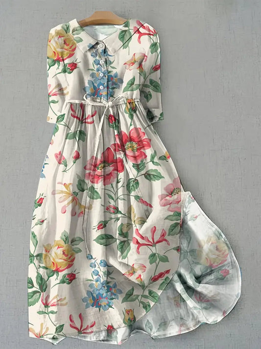 Women's Aurora Floral midi dress. Elegant, comfortable short sleeve summer dress perfect for chic everyday wear.