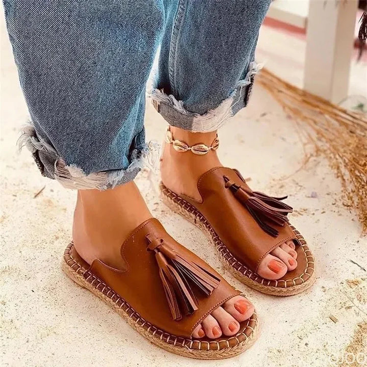 Azalea women's casual slip-on slides, featuring a woven design & cushioned sole, great for summer comfort.