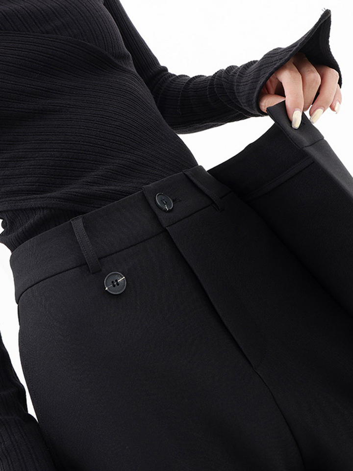 Comfortable women's baggy trousers with a relaxed fit, wide leg, and stylish asymmetric waist for everyday wear.