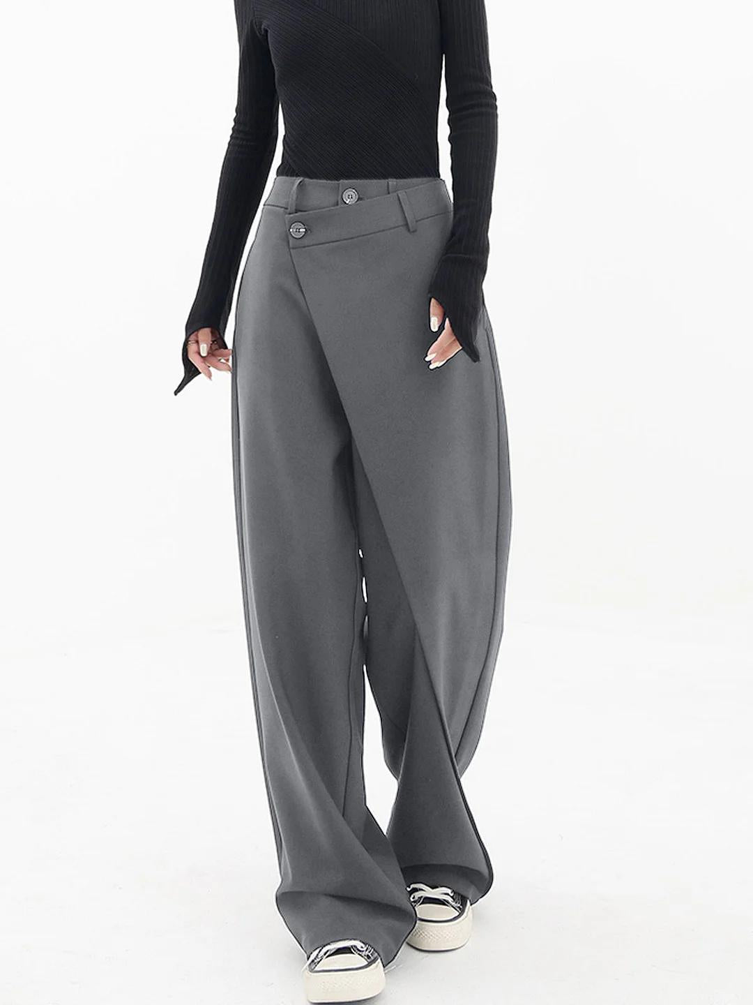 Trendy women's baggy trousers with a relaxed fit, wide leg, and stylish asymmetric waist for versatile fashion.