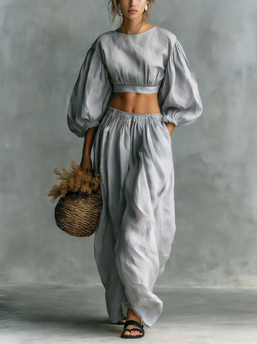 Chic women's two-piece set: elegant balloon sleeve top & flowing wide leg trousers for effortless style.
