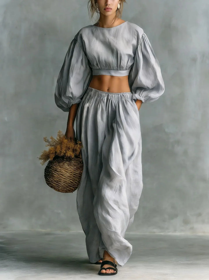 Chic women's two-piece set: elegant balloon sleeve top & flowing wide leg trousers for effortless style.
