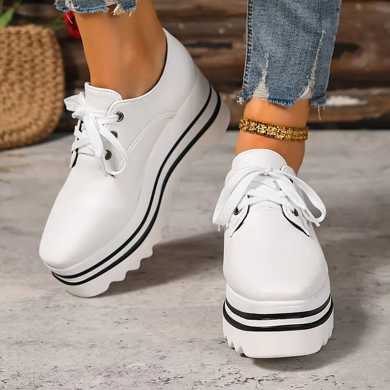Durable white women's casual sneakers, designed for maximum comfort, style & foot support.