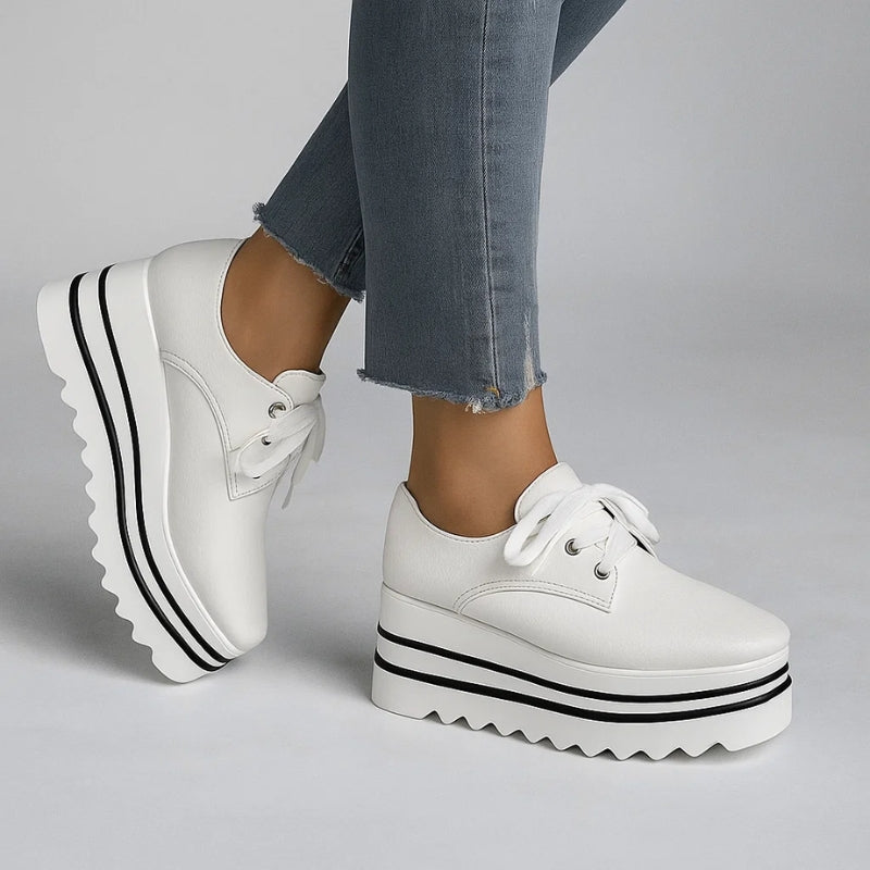 Stylish black orthopedic walking shoes for women, offering essential arch and foot support for daily activity.