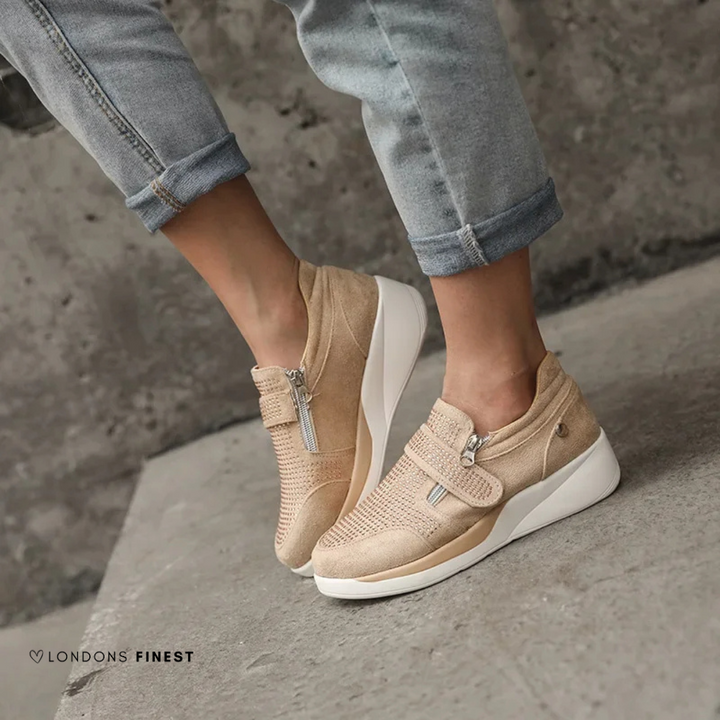 Women's beige walking sneakers with advanced arch support & cushioned comfort for everyday wear & stable walking.