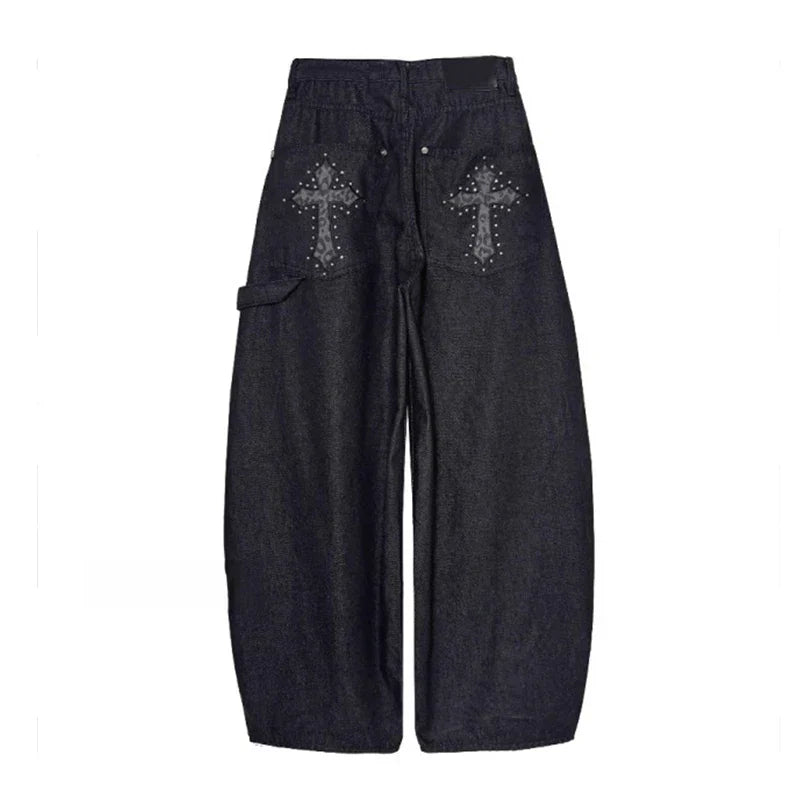 Black baggy wide-leg pants for women, featuring a low-rise cut and grunge streetwear aesthetic.