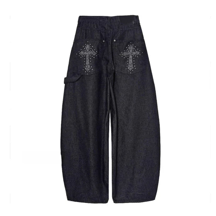 Black baggy wide-leg pants for women, featuring a low-rise cut and grunge streetwear aesthetic.