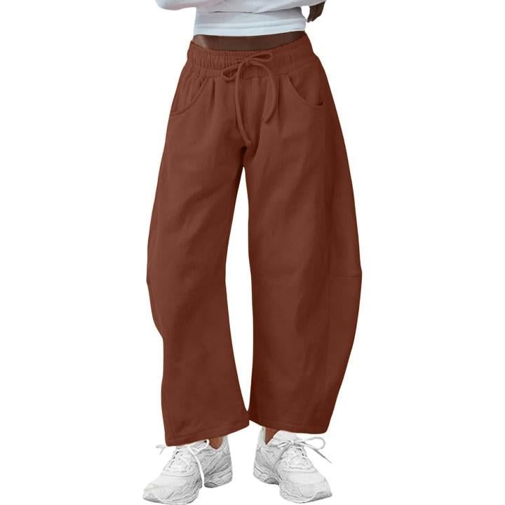 Chic brown barrel-leg women's pants, perfect for casual wear with a relaxed fit and comfortable drawstring.