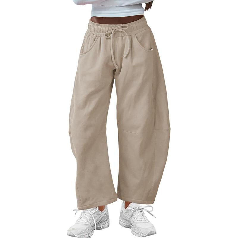 Versatile beige barrel-leg pants for women, offering a relaxed fit and drawstring waist for everyday comfort.