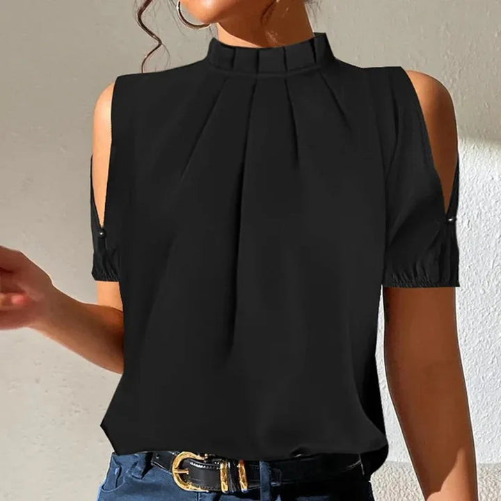 Elegant women's black pleated blouse with fashionable flared sleeves & high collar. Ideal for winter office wear.