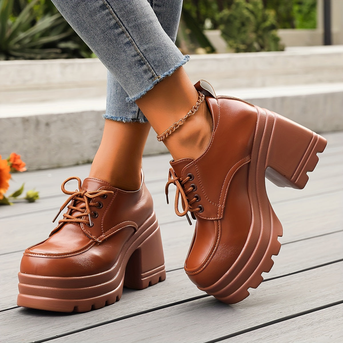 Comfortable women's lace-up chunky platform oxfords, versatile for daily wear and fashion statements.