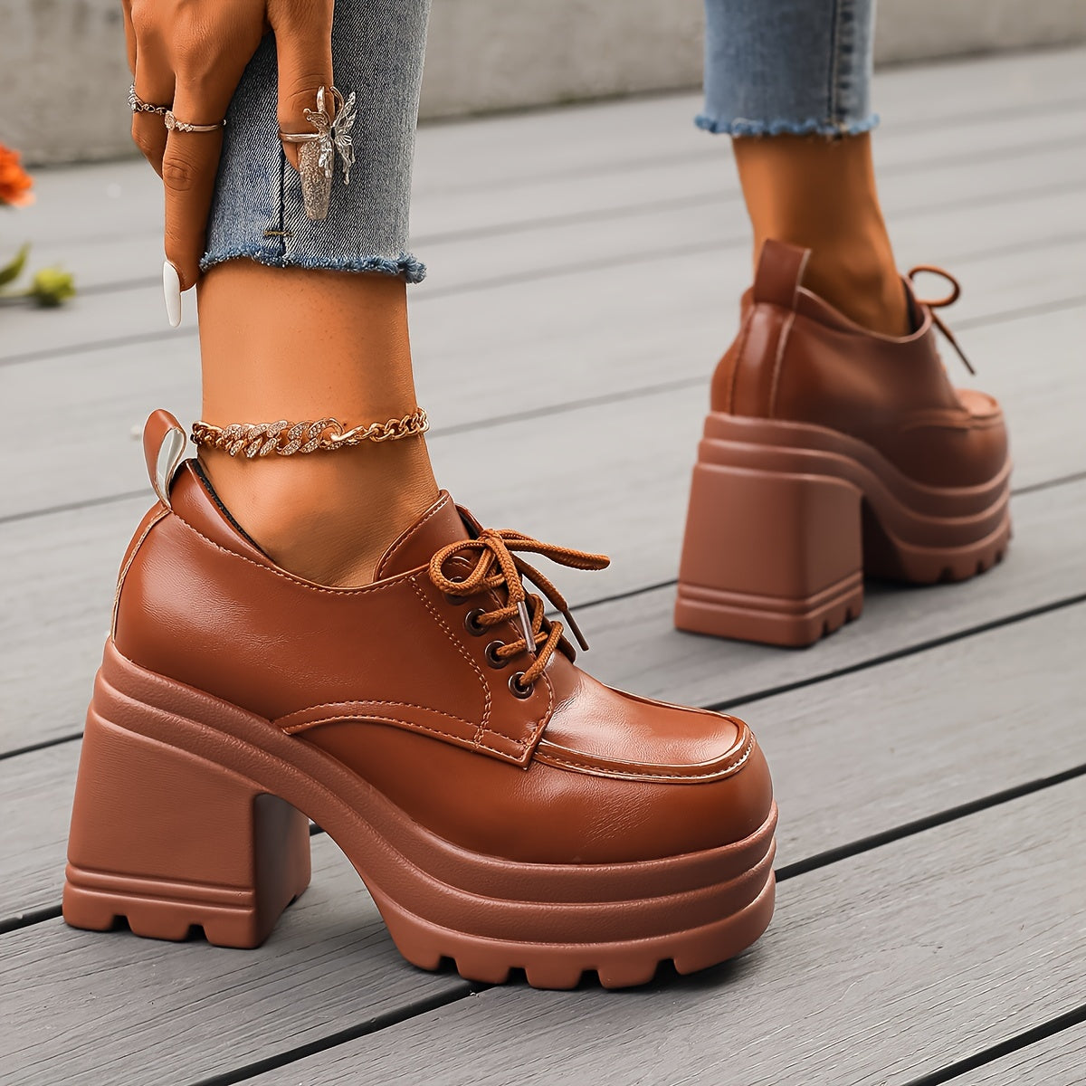 Elegant women's chunky platform oxfords, faux leather, with a sleek lace-up front and block heel.