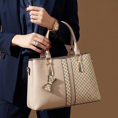 Fashionable woman carrying a black convertible shoulder bag. Perfect everyday versatile accessory.